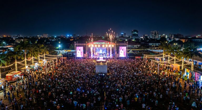 A night-time festival crowd in Accra